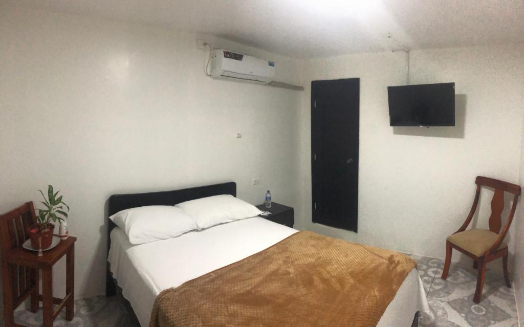 Postel nebo postele na pokoji v ubytování L'Vanna Hotel