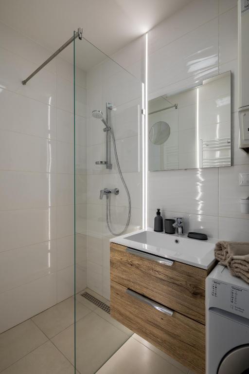 Koupelna v ubytování Stafétaház Apartmanok