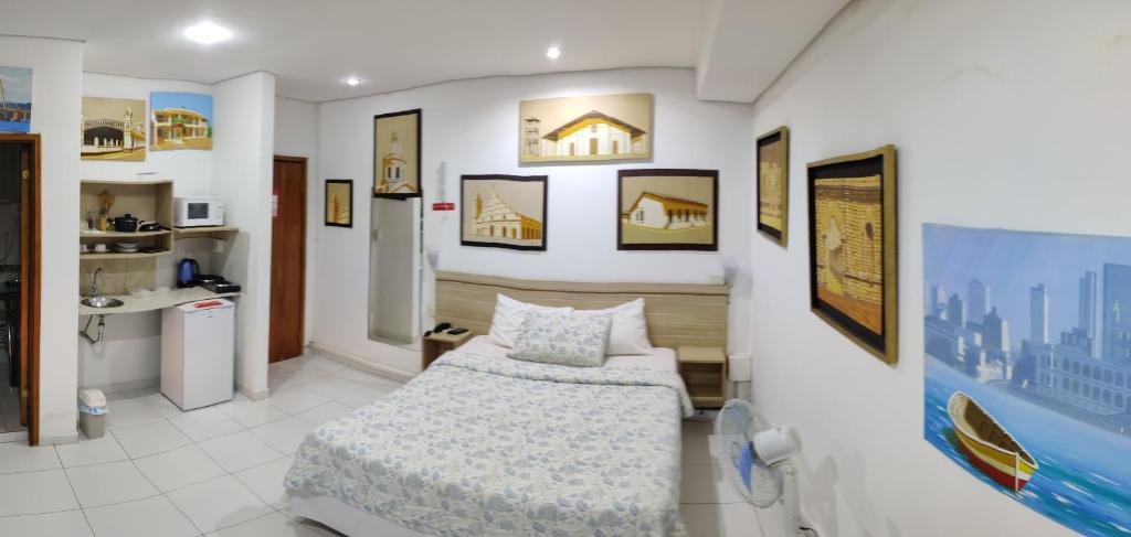 Postel nebo postele na pokoji v ubytování ApartHotel Maison Suisse