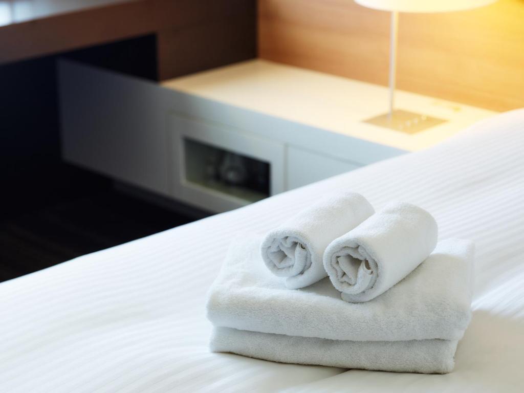 Postel nebo postele na pokoji v ubytování Mitsui Garden Hotel Ueno
