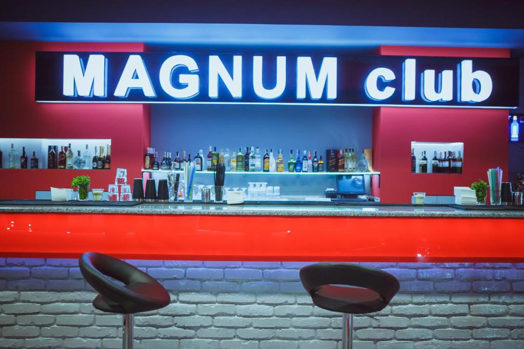 Lounge nebo bar v ubytování Magnum