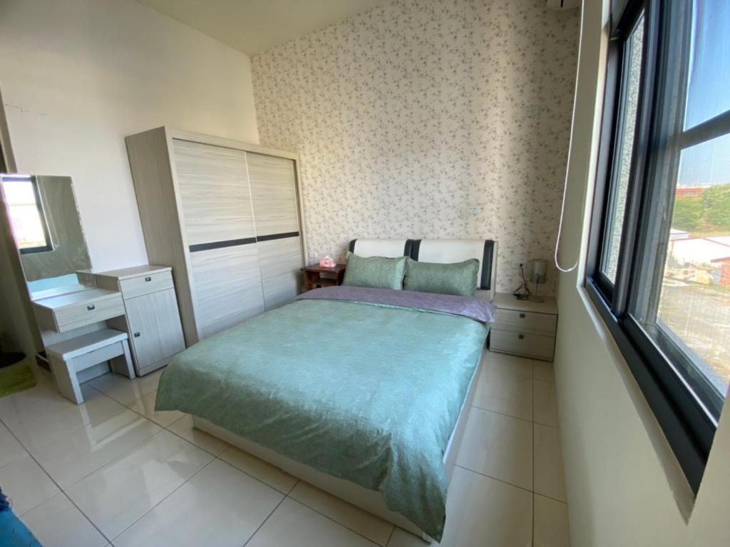 Ένα ή περισσότερα κρεβάτια σε δωμάτιο στο The Way Hostel & Bar