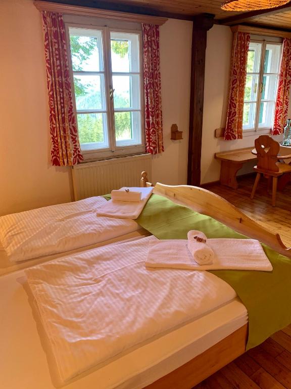 Posteľ alebo postele v izbe v ubytovaní Das AlplResort "ALMfrequenz"
