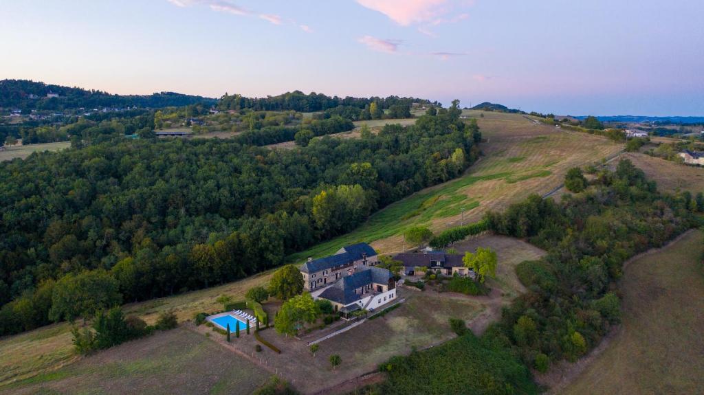 an aerial view of a large house on a hill at Domaine Leyvinie, gite Mourvedre, close to the Dordogne in Perpezac-le-Blanc