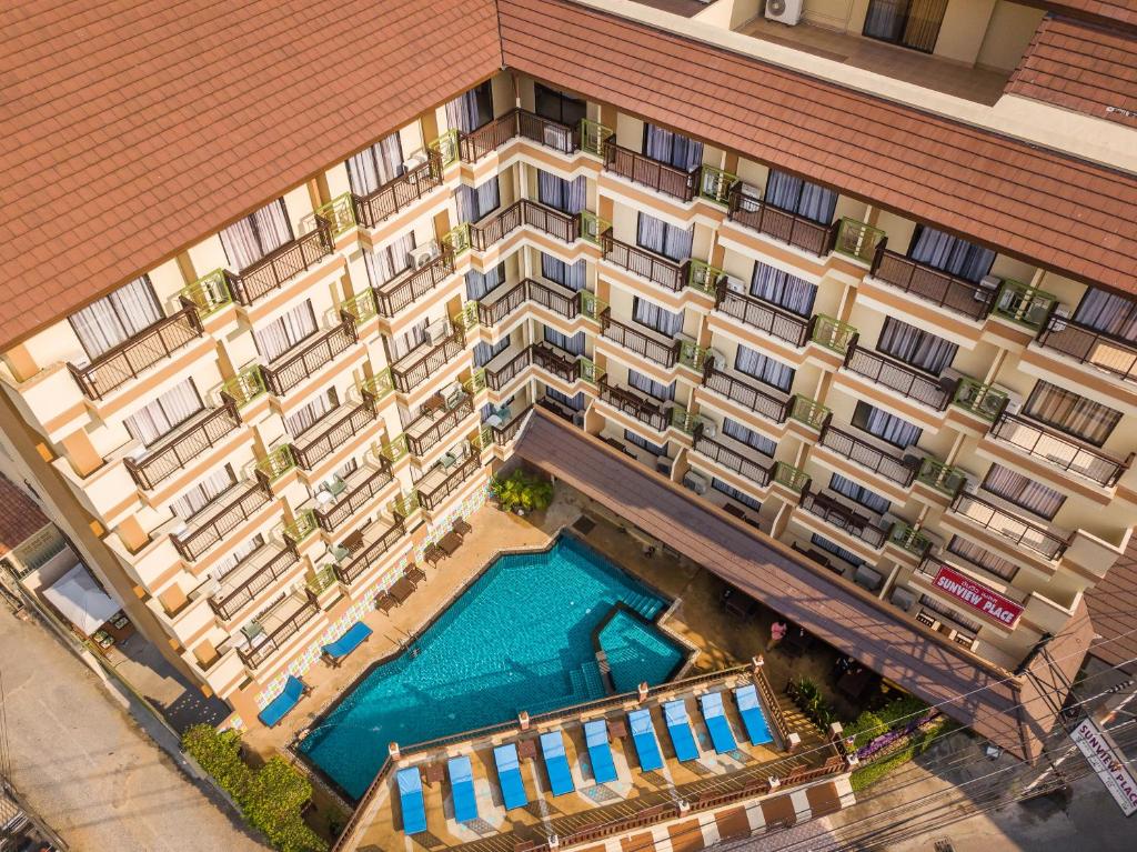 an overhead view of a hotel with a swimming pool at Sunview Place in Pattaya Central