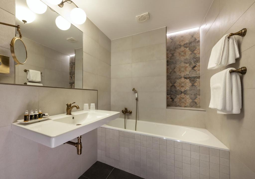 Koupelna v ubytování EFI SPA Hotel Superior & Pivovar