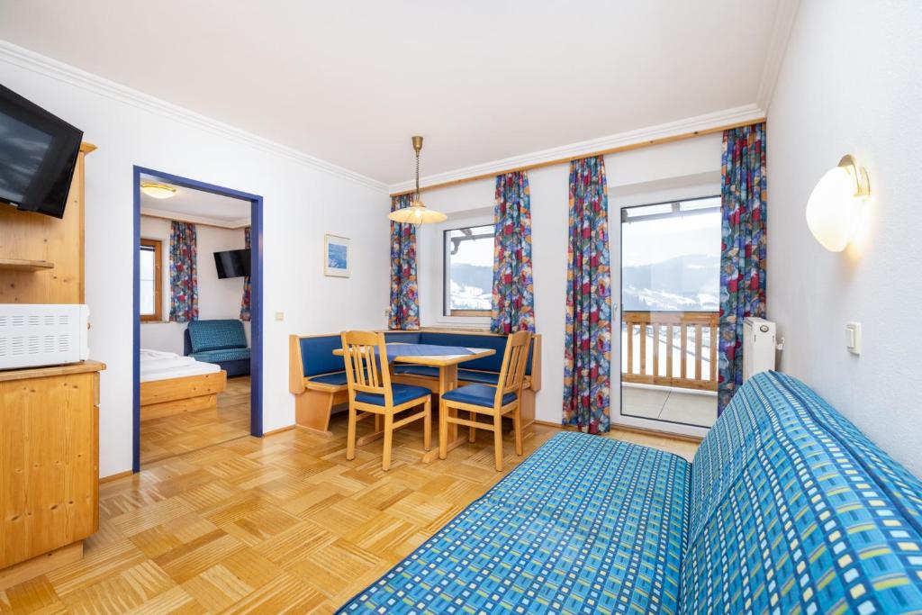 Posteľ alebo postele v izbe v ubytovaní Aparthotel am Reitecksee