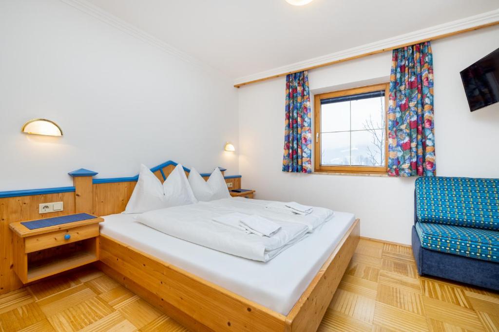 Posteľ alebo postele v izbe v ubytovaní Aparthotel am Reitecksee