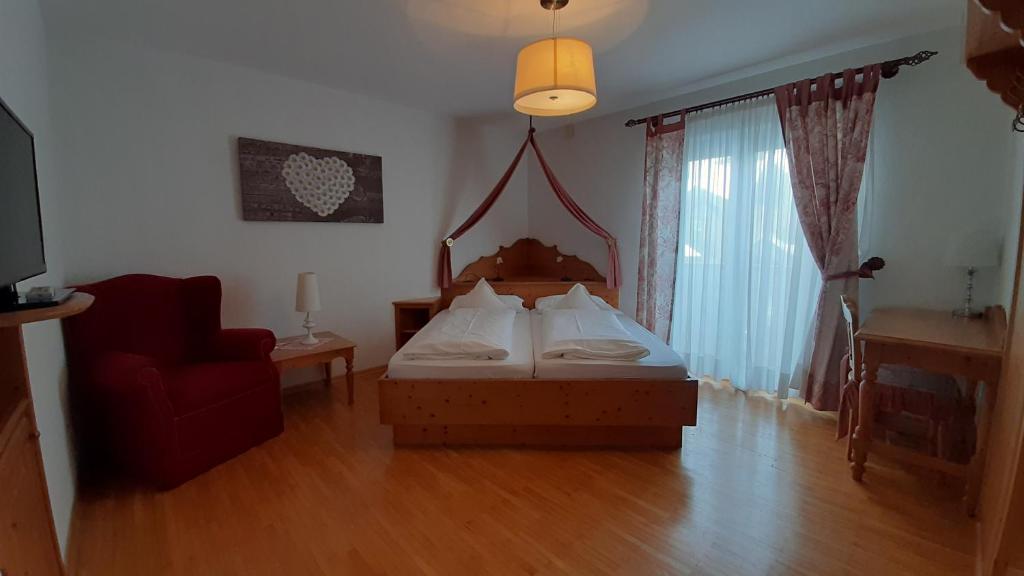 Postel nebo postele na pokoji v ubytování Parc Hotel Florian