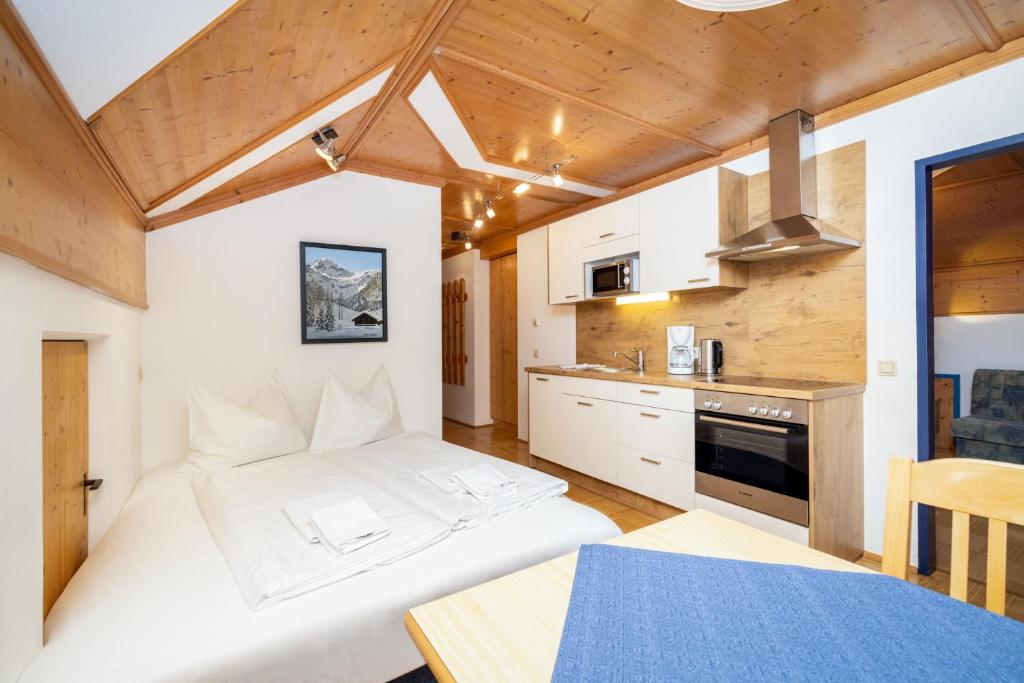 Kuchyňa alebo kuchynka v ubytovaní Aparthotel am Reitecksee