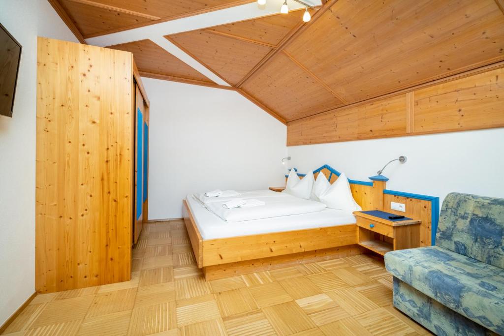 Posteľ alebo postele v izbe v ubytovaní Aparthotel am Reitecksee