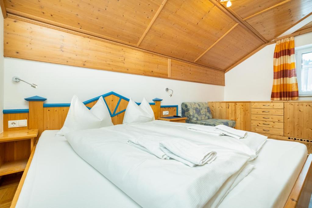 Posteľ alebo postele v izbe v ubytovaní Aparthotel am Reitecksee
