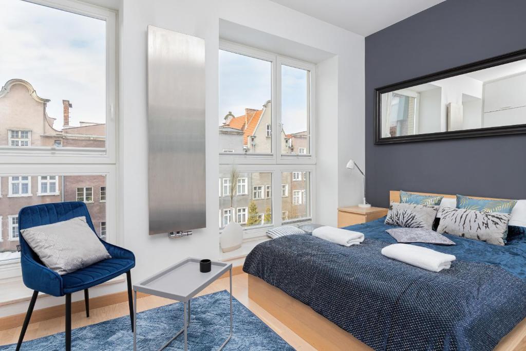 Posteľ alebo postele v izbe v ubytovaní Old Town Neptun Apartments by Noclegi Renters