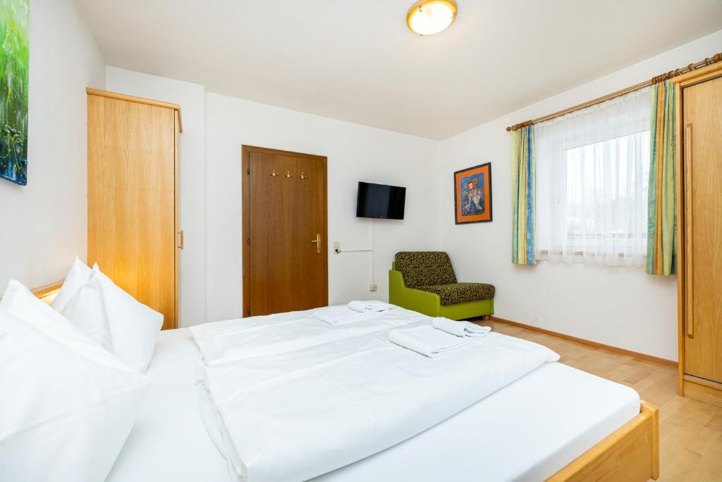 Posteľ alebo postele v izbe v ubytovaní Aparthotel am Reitecksee