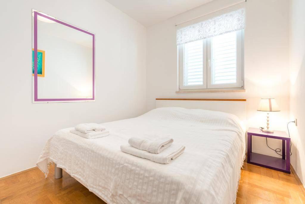 Posteľ alebo postele v izbe v ubytovaní Apartment Nika Solitudo
