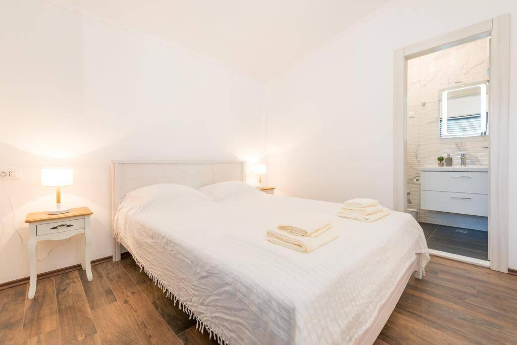 Posteľ alebo postele v izbe v ubytovaní Apartment Nika Solitudo