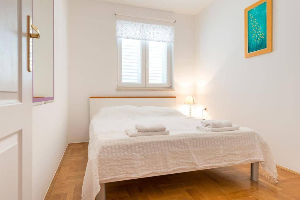 Posteľ alebo postele v izbe v ubytovaní Apartment Nika Solitudo