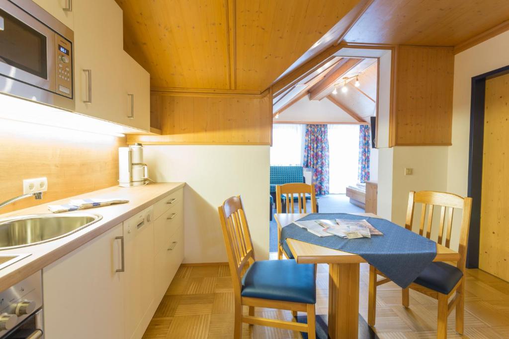 Kuchyňa alebo kuchynka v ubytovaní Aparthotel am Reitecksee