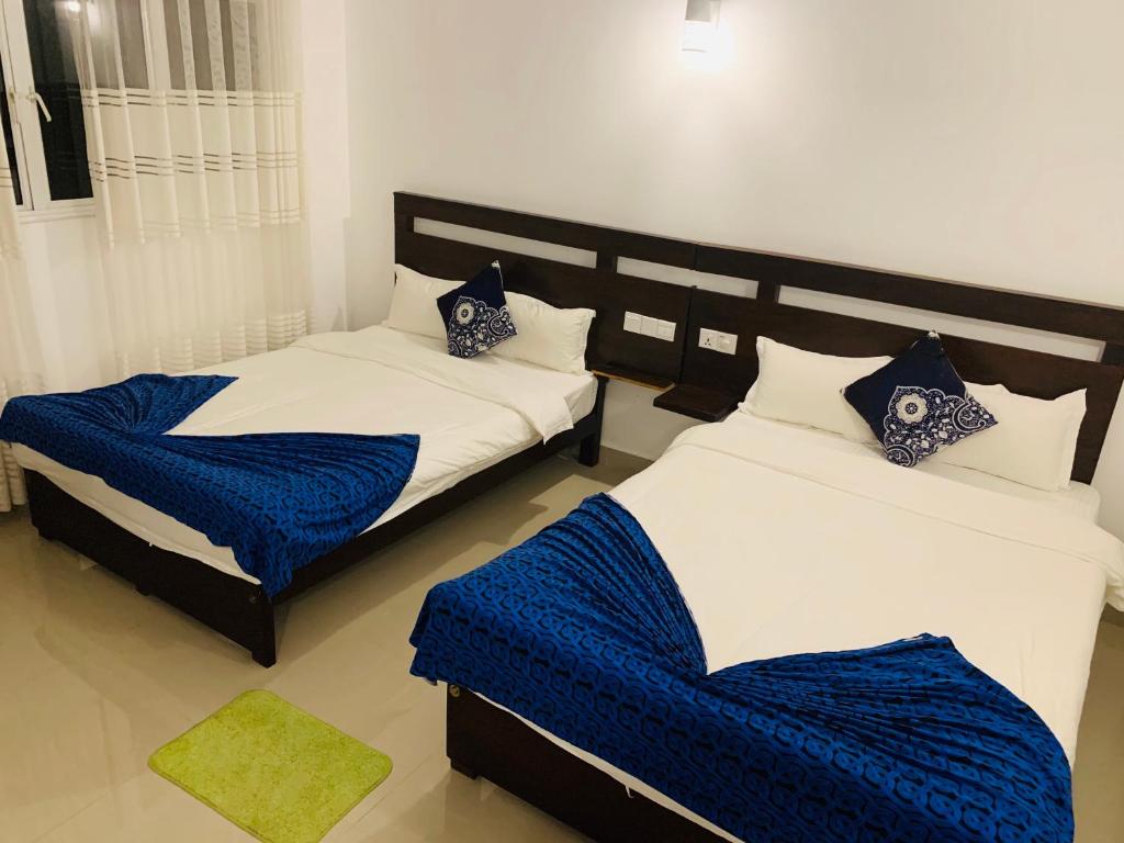 Postel nebo postele na pokoji v ubytování Lavenro Hotel & Resort