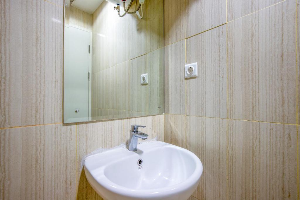 Koupelna v ubytování Skyview Sentul Tower Apartments