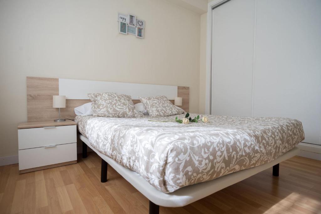 Postel nebo postele na pokoji v ubytování Sirenas Playa Ha Apartment