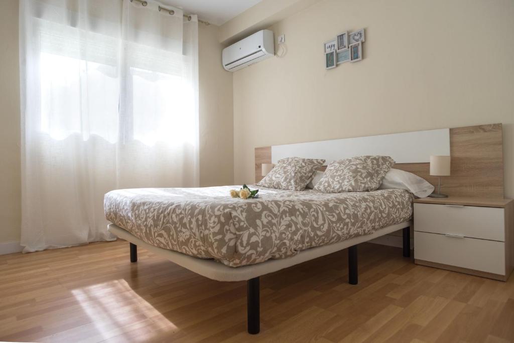 Postel nebo postele na pokoji v ubytování Sirenas Playa Ha Apartment