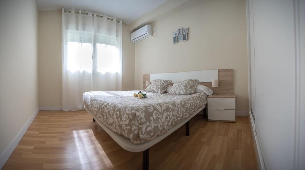 Postel nebo postele na pokoji v ubytování Sirenas Playa Ha Apartment