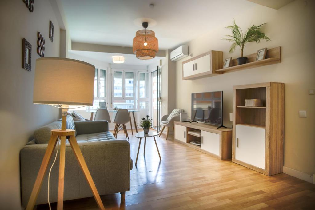 TV a/nebo společenská místnost v ubytování Sirenas Playa Ha Apartment