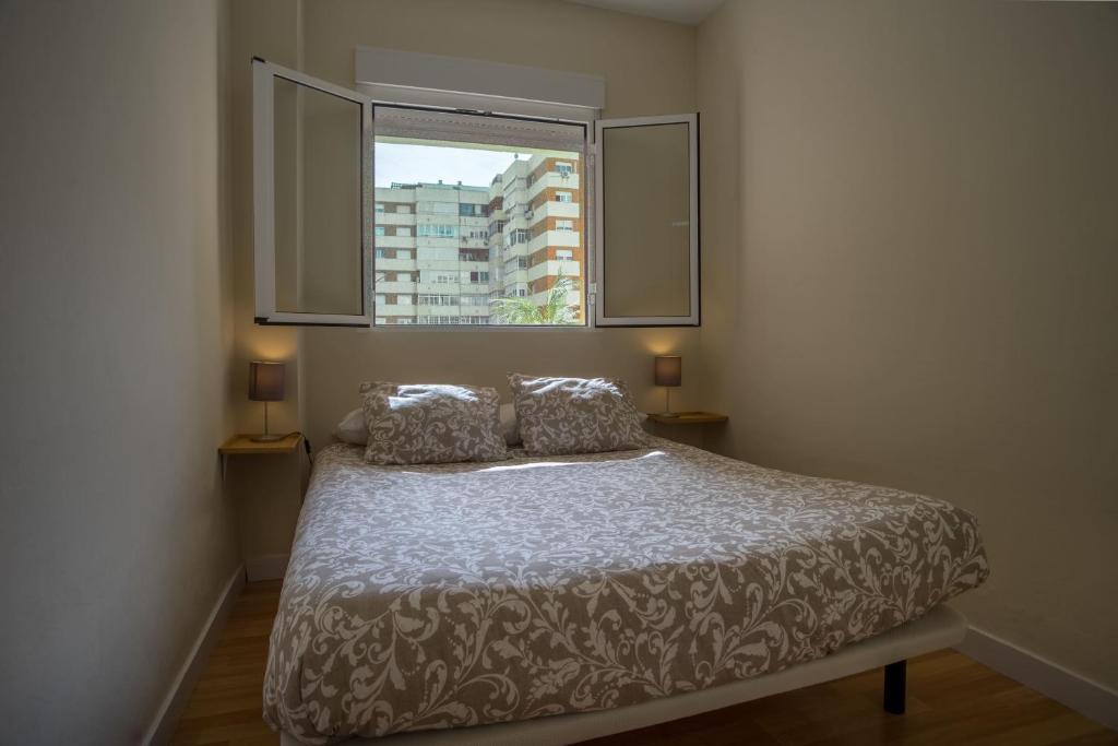 Postel nebo postele na pokoji v ubytování Sirenas Playa Ha Apartment