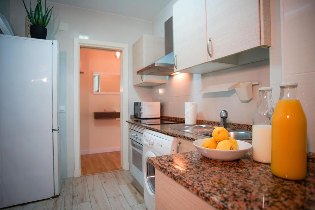 Kuchyň nebo kuchyňský kout v ubytování Sirenas Playa Ha Apartment