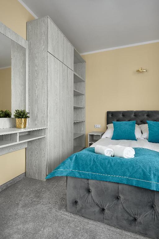Postel nebo postele na pokoji v ubytování Sanatorium Zefir