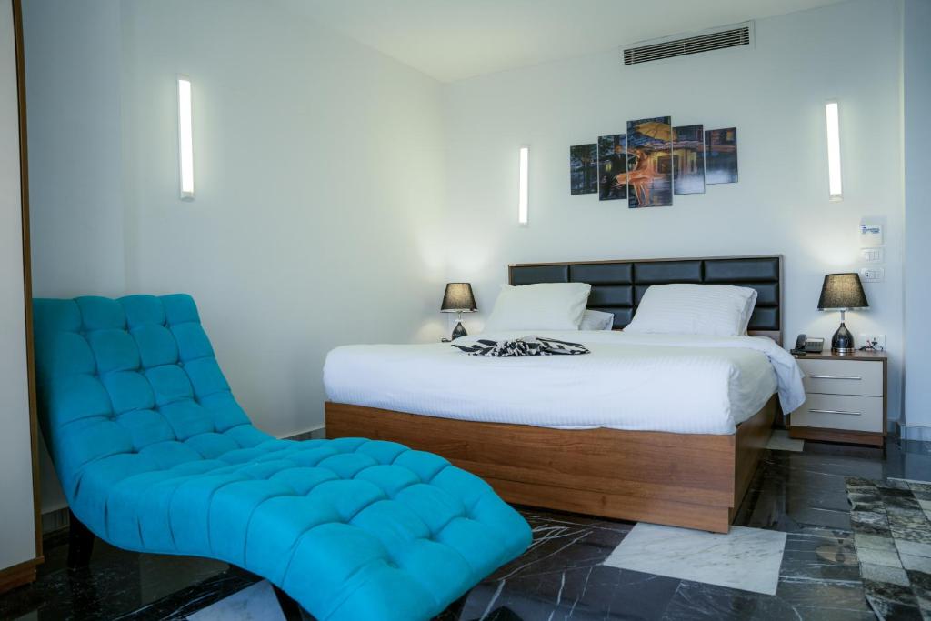 Postel nebo postele na pokoji v ubytování Hotel Royal Marshal