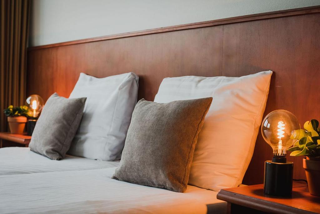 Postel nebo postele na pokoji v ubytování Hotel Riche
