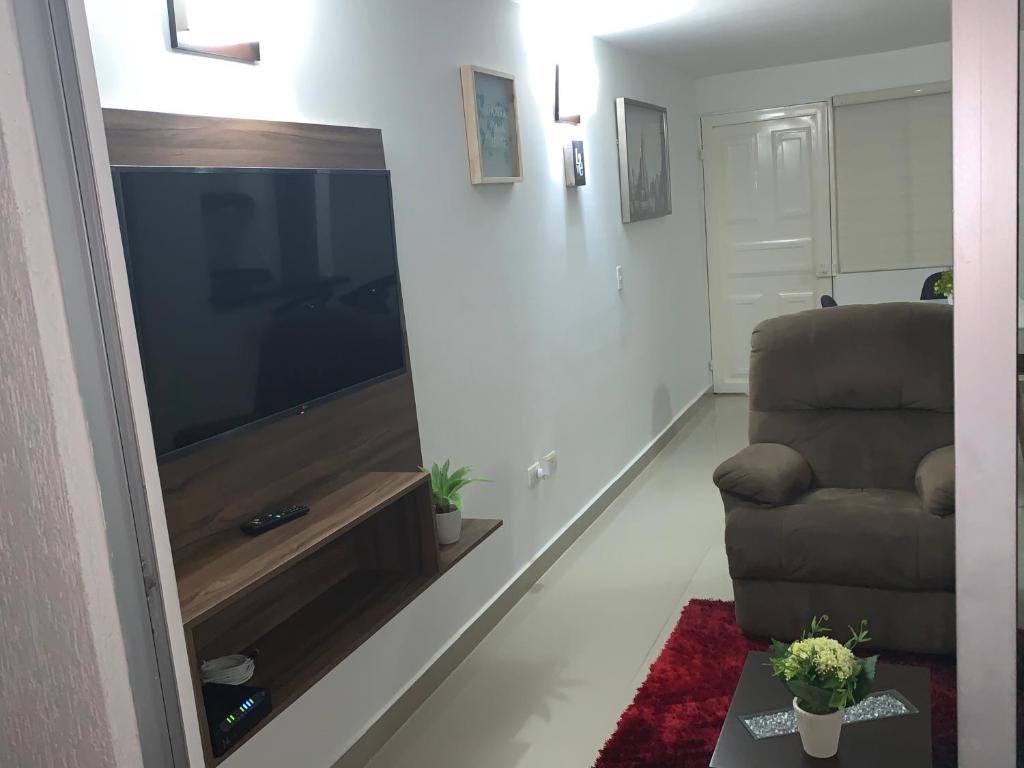 Hermoso Apartamento, aire acondicionado y Wifi.