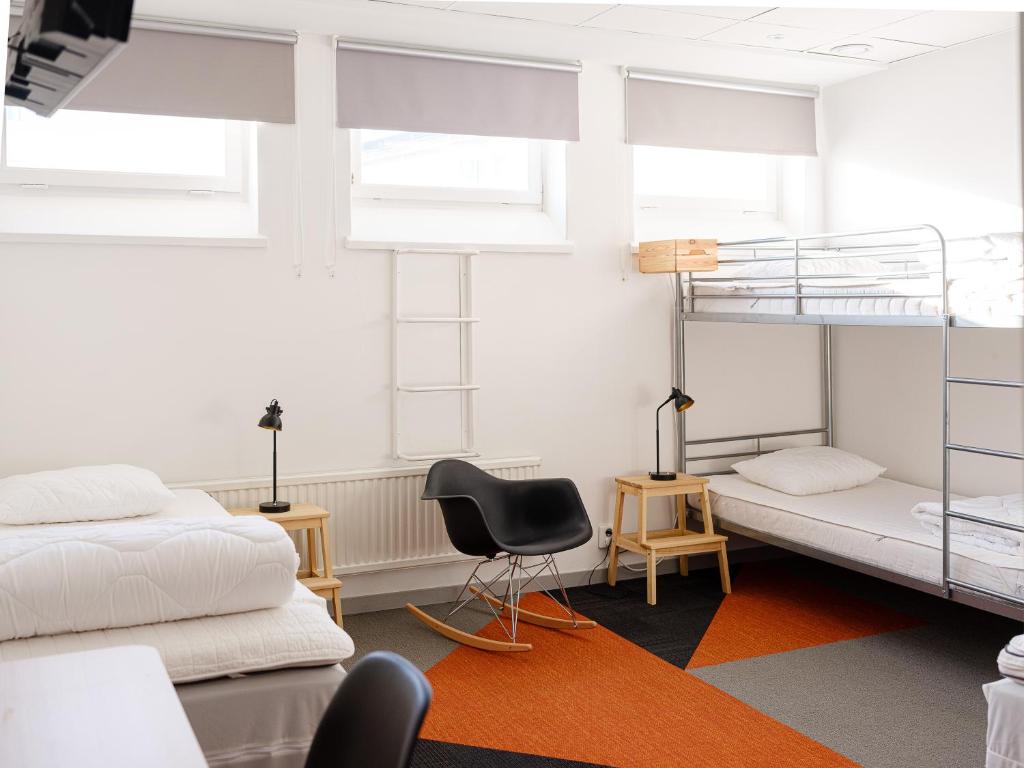 Postel nebo postele na pokoji v ubytování Norrland YMCA Hostel Umeå