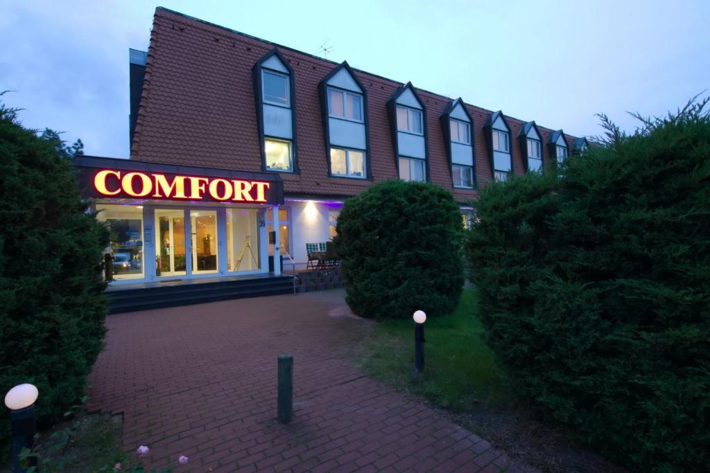 a building with a sign that reads comfort at Comfort Hotel Bernau in Bernau bei Berlin