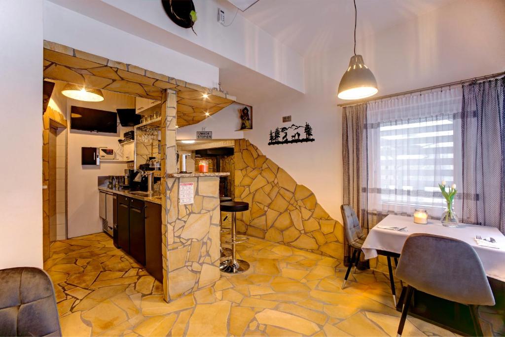 Kuchyňa alebo kuchynka v ubytovaní Apartamenty Bieszczady