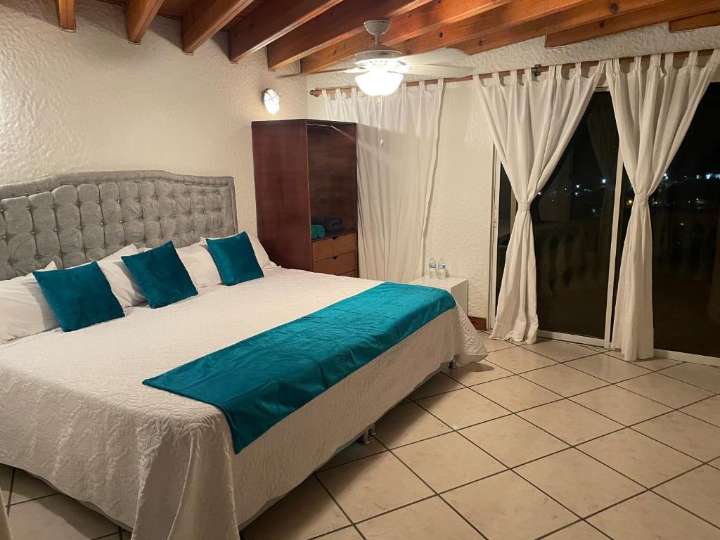 Postel nebo postele na pokoji v ubytování APARTAMENTOS TT9