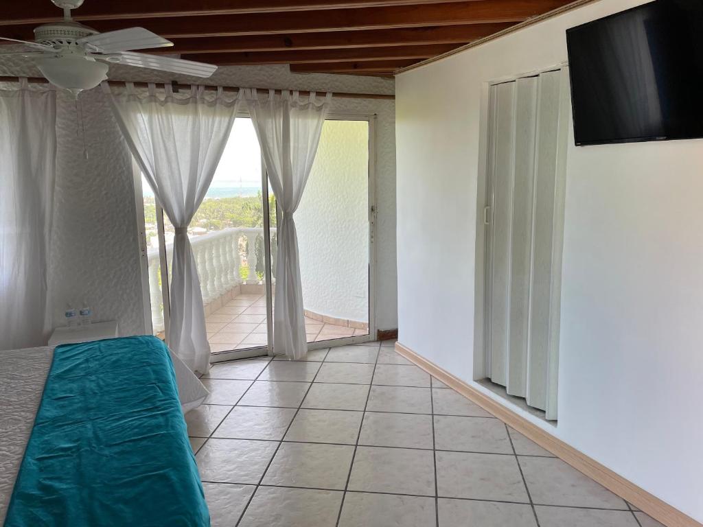 TV a/nebo společenská místnost v ubytování APARTAMENTOS TT9