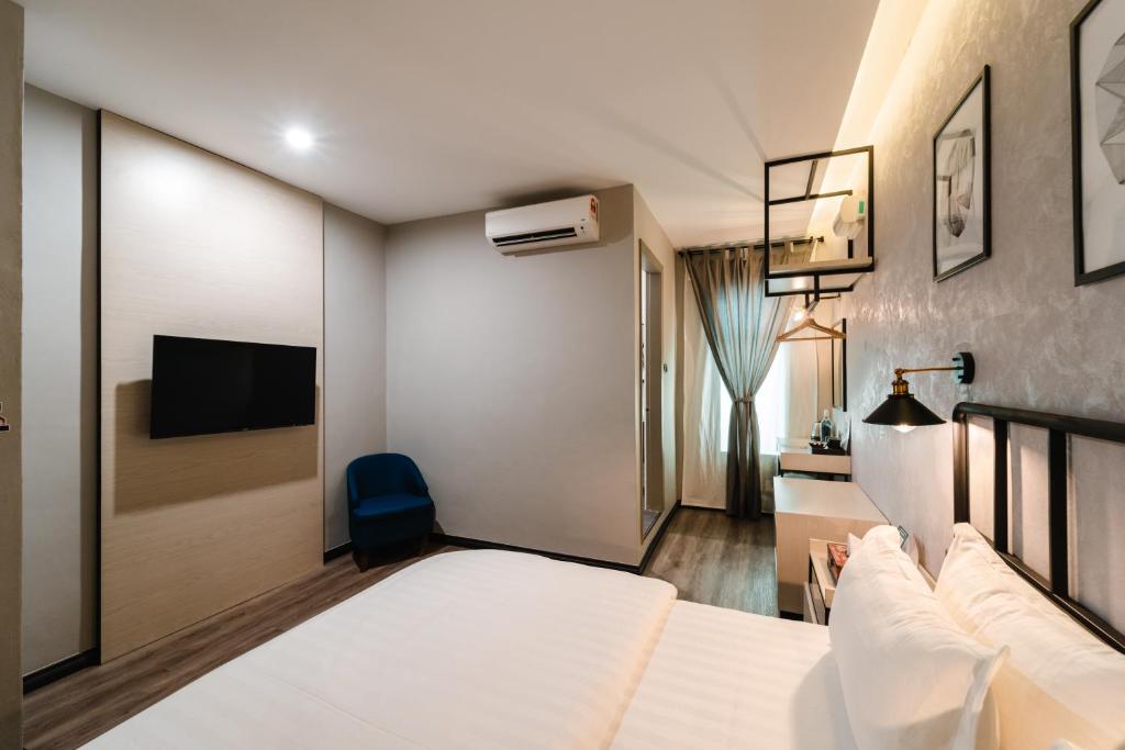Postel nebo postele na pokoji v ubytování SVOK Hotel