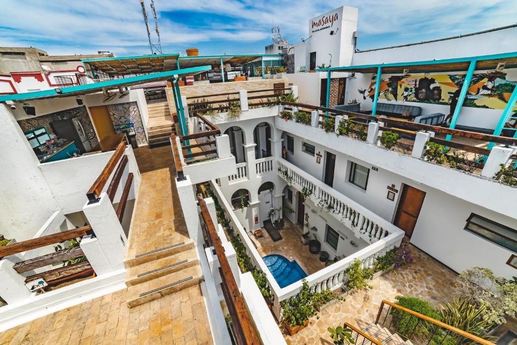 an aerial view of a white building with stairs at Masaya Santa Marta in Santa Marta
