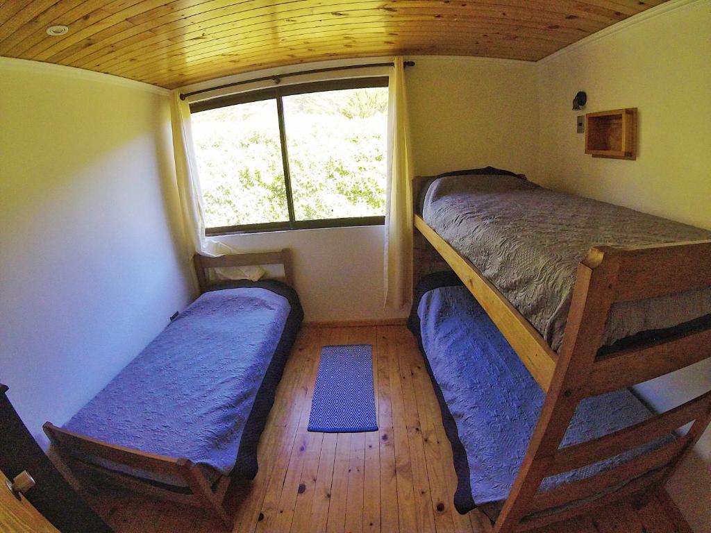 Postel nebo postele na pokoji v ubytování Mar de Lobos