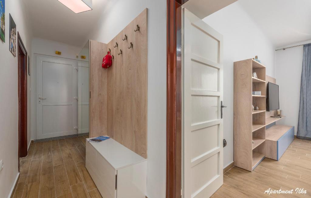 Łóżko lub łóżka w pokoju w obiekcie Apartmani Nena i Ilka