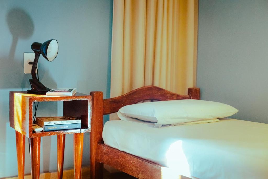 Postel nebo postele na pokoji v ubytování Cosmopolitan Hostel
