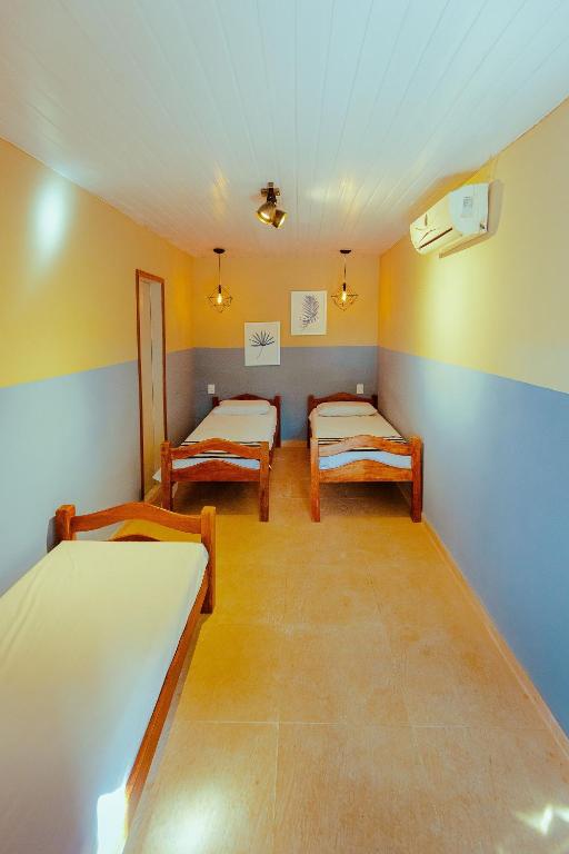 Postel nebo postele na pokoji v ubytování Cosmopolitan Hostel