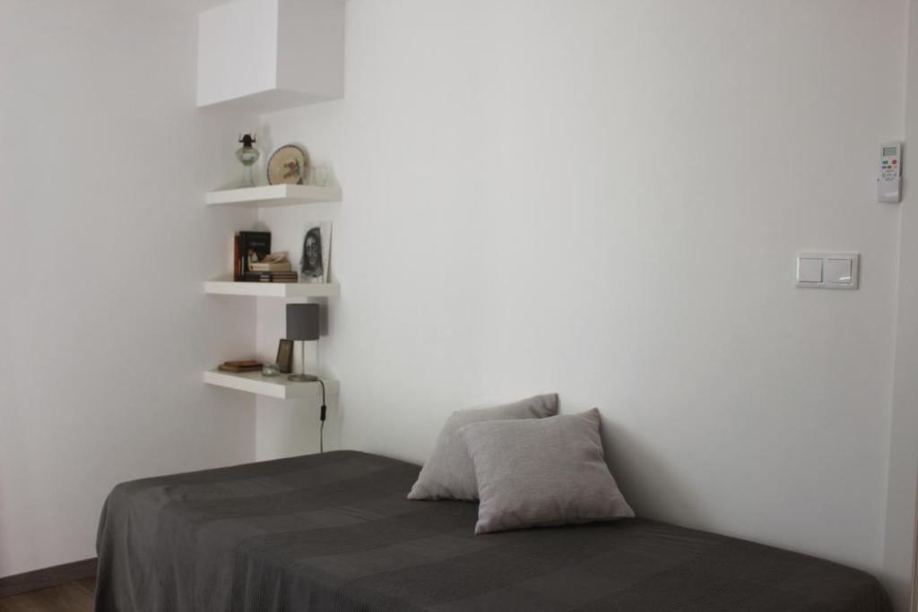 Uma cama ou camas num quarto em Casas d'Almofala