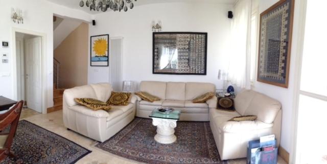 A seating area at Bed & Breakfast Case Osti