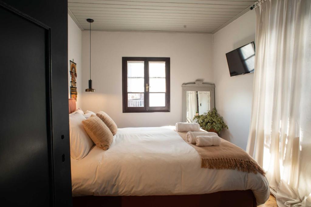 Postel nebo postele na pokoji v ubytování Philos Guesthouse