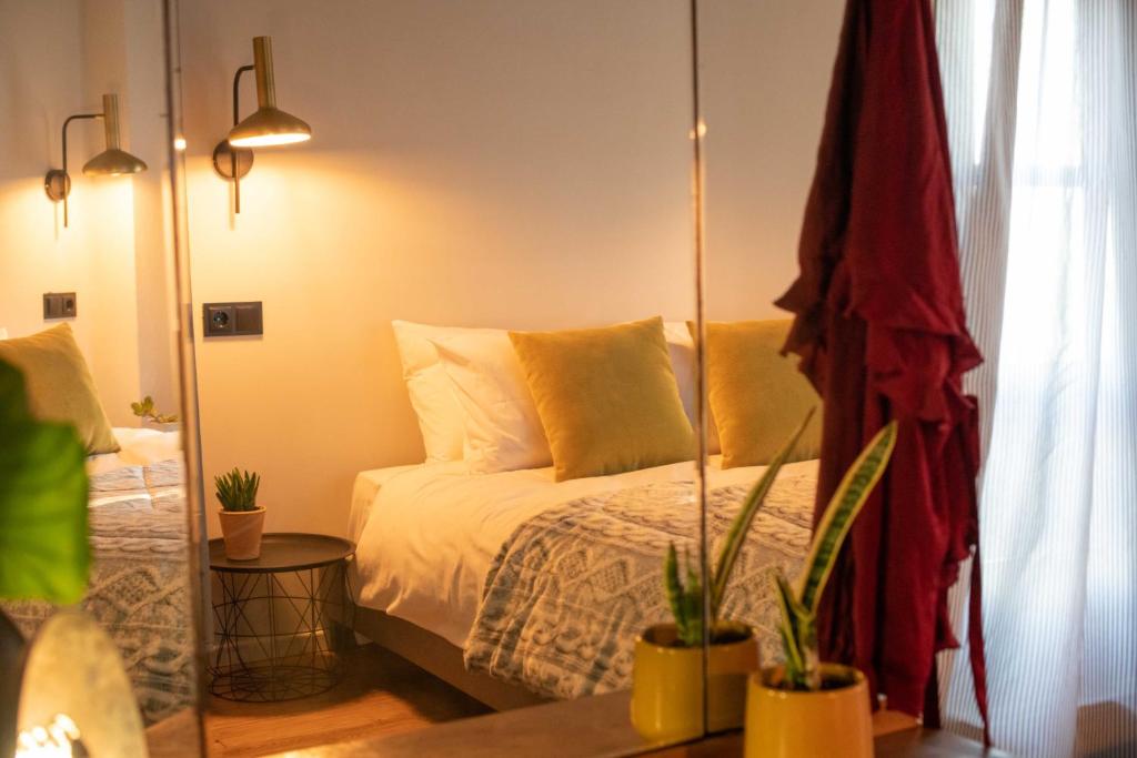 Postel nebo postele na pokoji v ubytování Philos Guesthouse