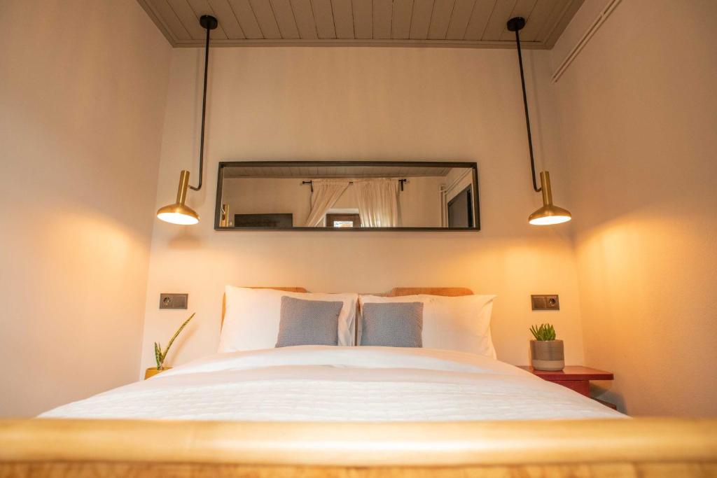 Postel nebo postele na pokoji v ubytování Philos Guesthouse